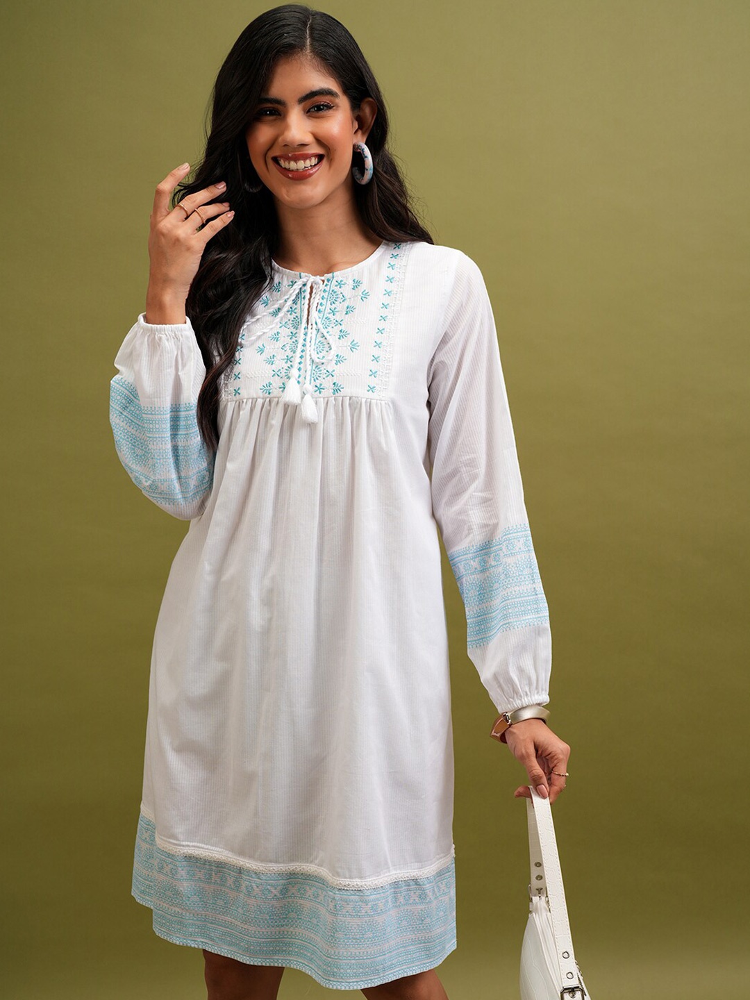 

Vishudh White Floral Embroidered Tie-Up Neck Cotton Empire Dress