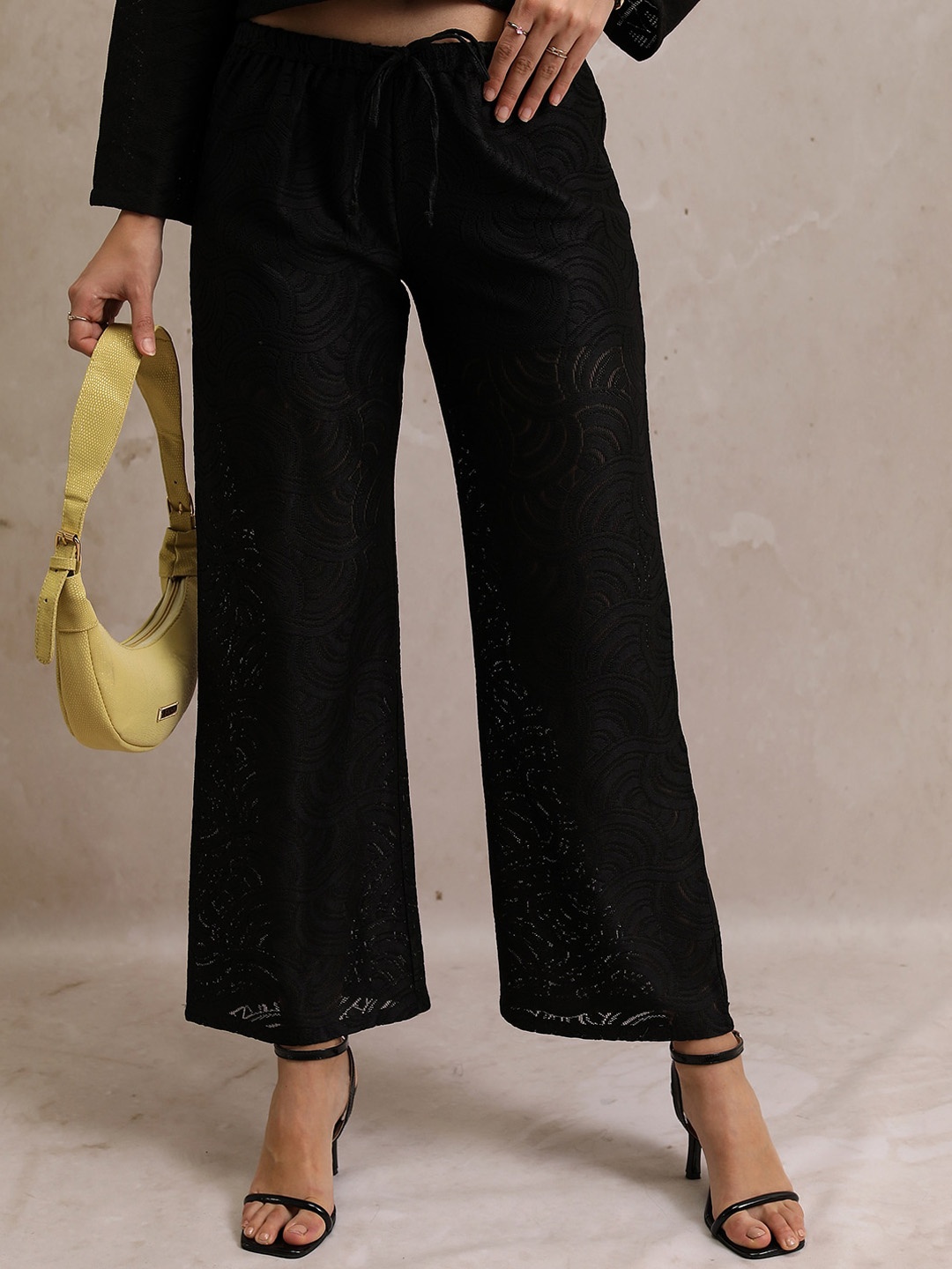 

Tokyo Talkies Women Mid-Rise Flared Trousers, Black