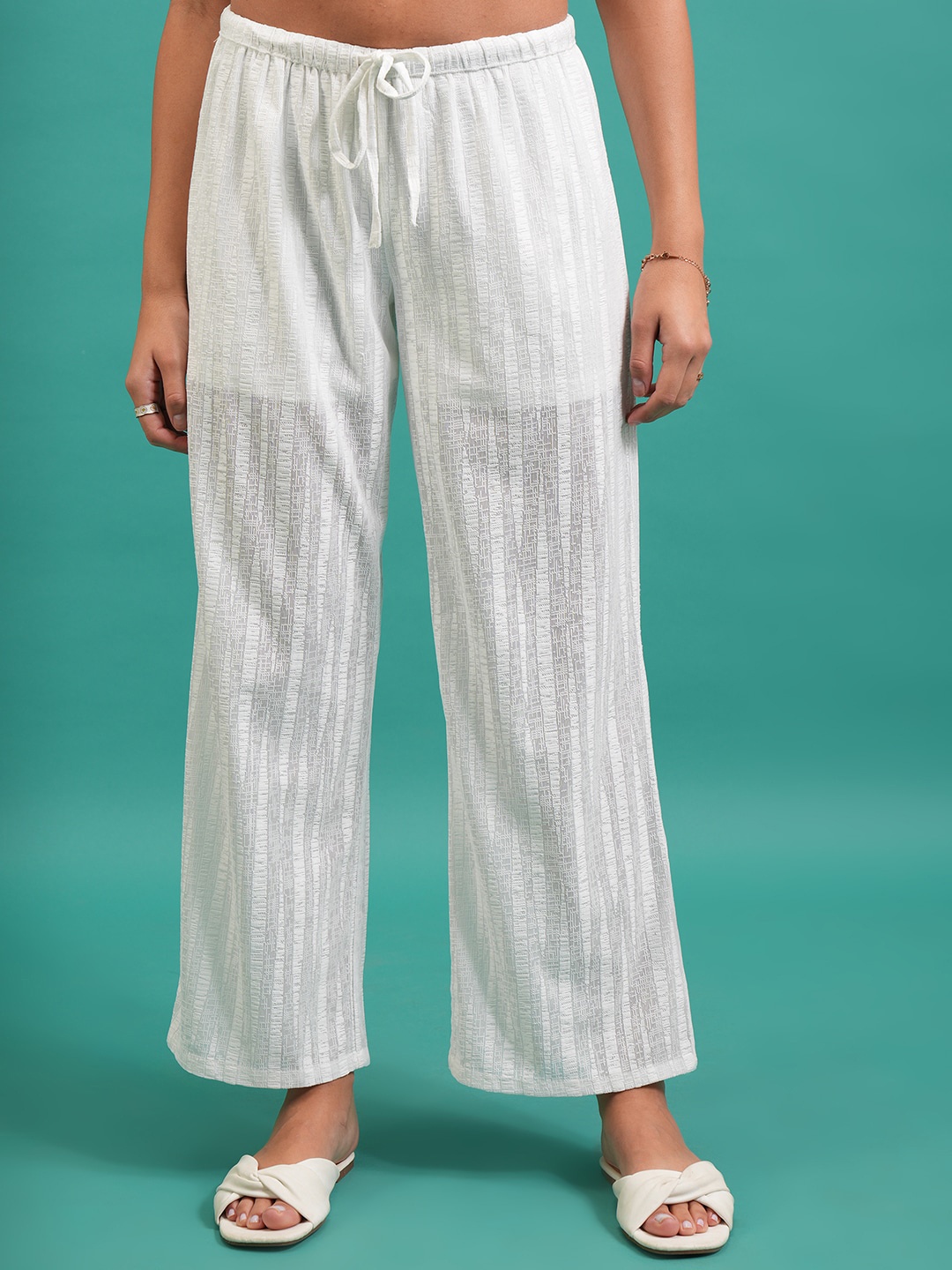 

Tokyo Talkies Women White Striped Flared Parallel Trousers