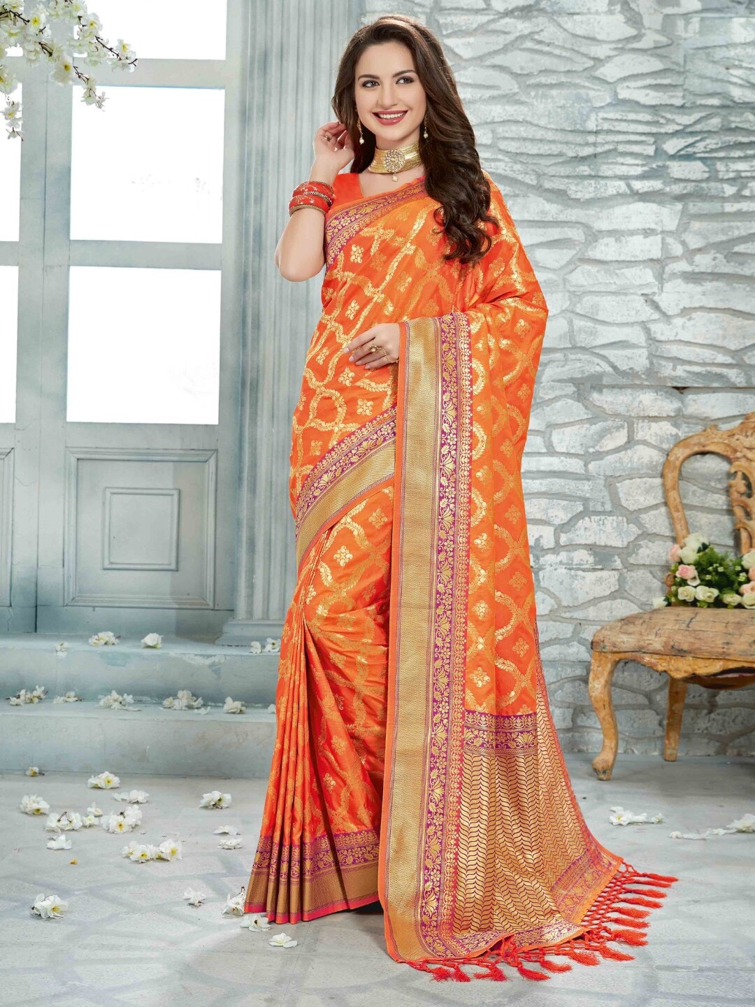 

Mitera Orange Ethnic Motifs Woven Design Zari Banarasi Saree