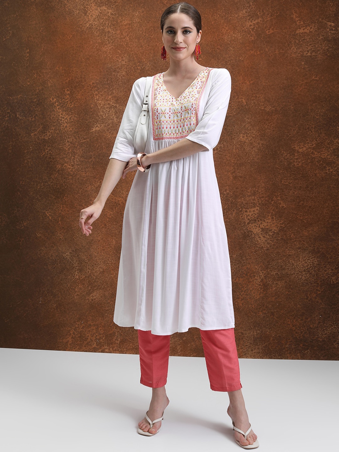

Vishudh White Geometric Yoke Design Thread Work A-Line Kurta