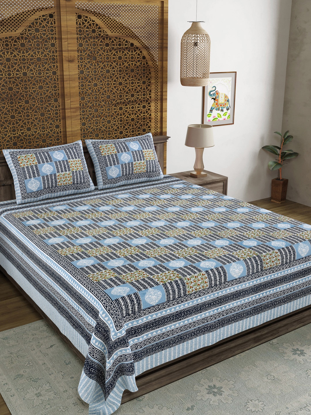 

Sangria Blue & Brown Printed Cotton 210 TC King Bedsheet With 2 Pillow Covers