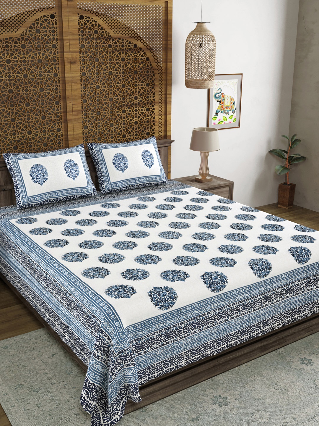 

Sangria Blue & White Printed Cotton 210 TC King Bedsheet With 2 Pillow Covers