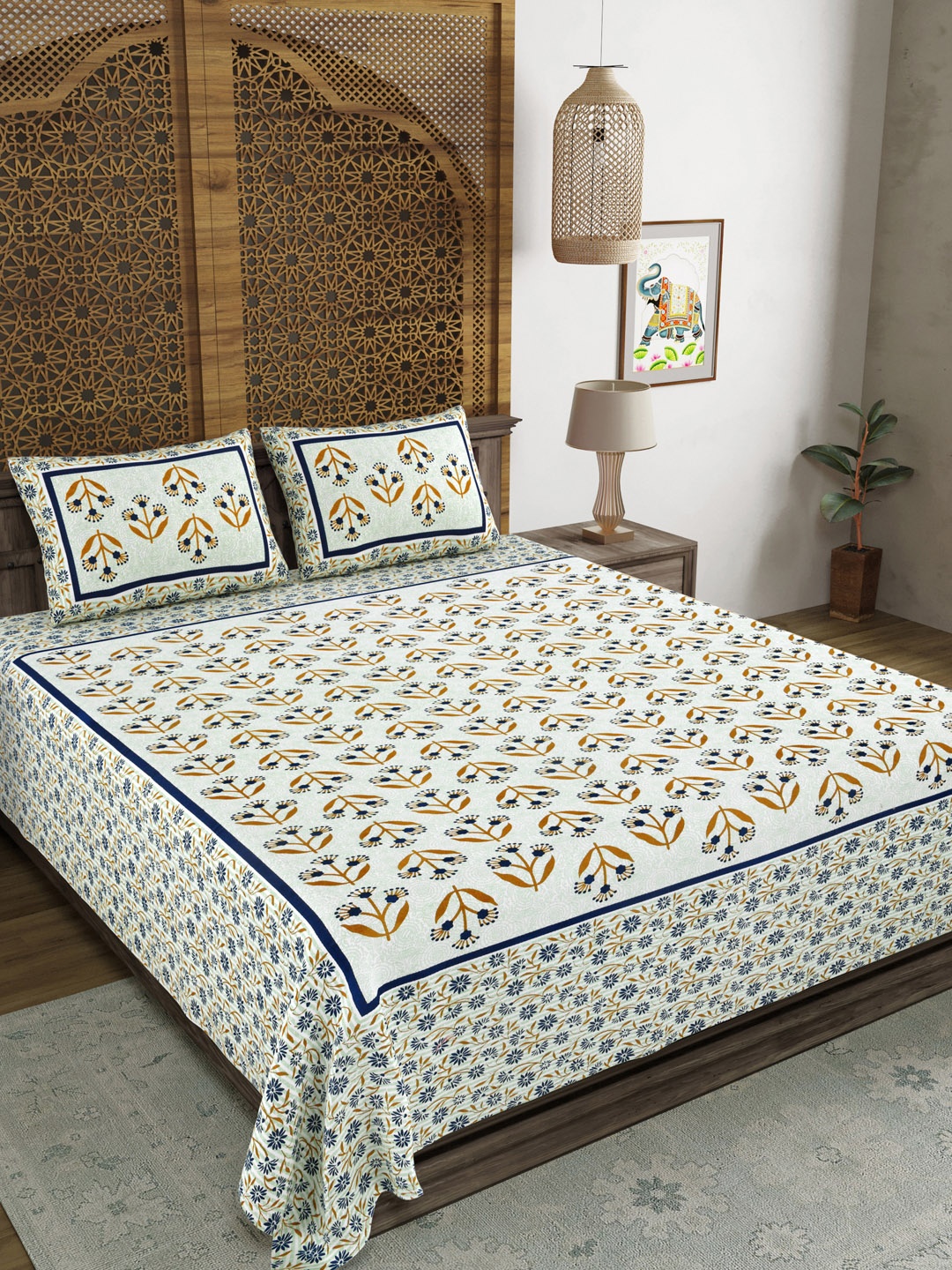 

Sangria Blue & White Printed Cotton 210 TC King Bedsheet With 2 Pillow Covers