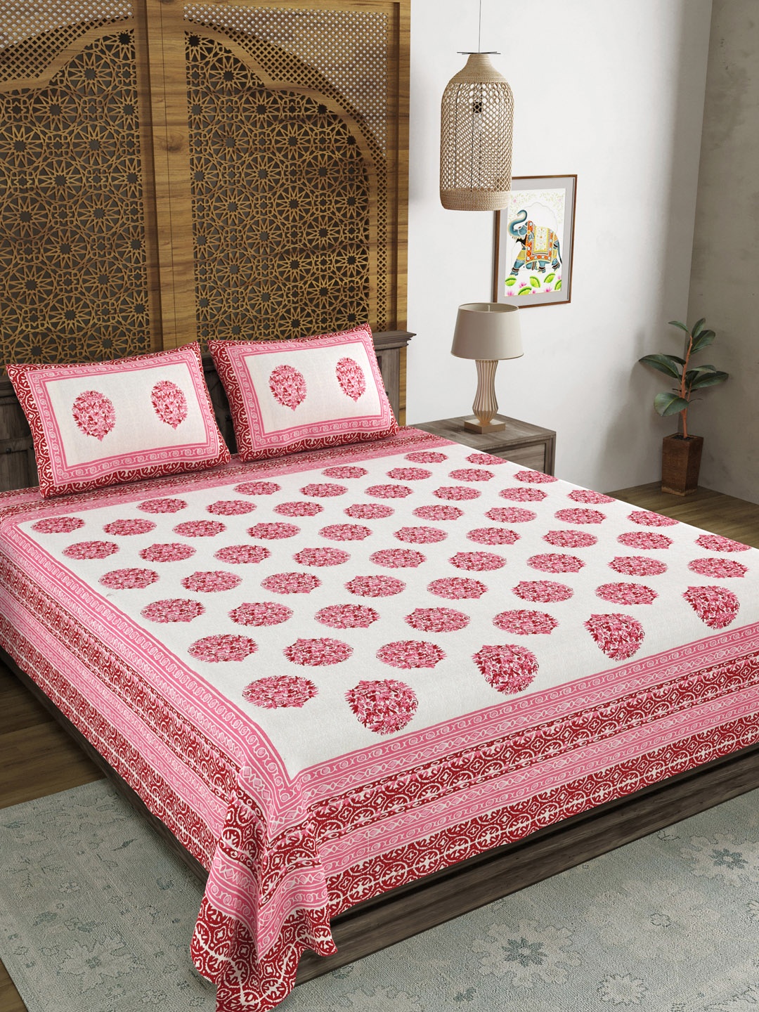 

Sangria Pink & White Printed Cotton 210 TC King Bedsheet With 2 Pillow Covers