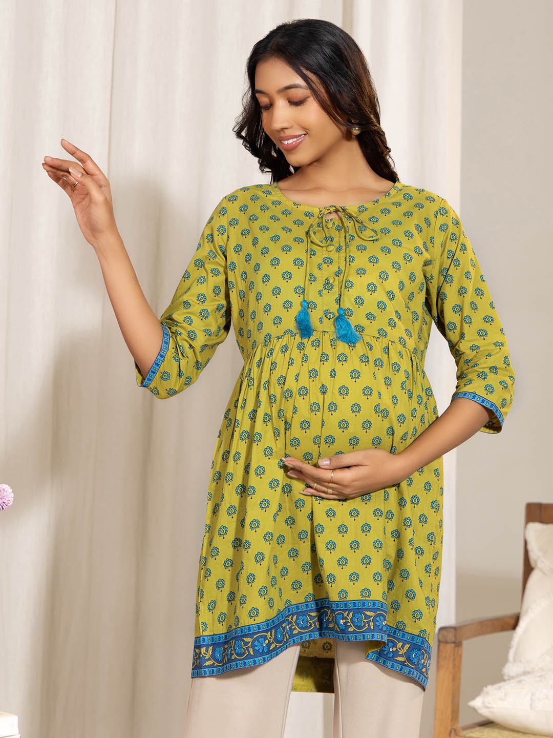 

Janasya Ethnic Motifs Printed Tie-Up Neck Cotton Maternity A-Line Tunic, Green