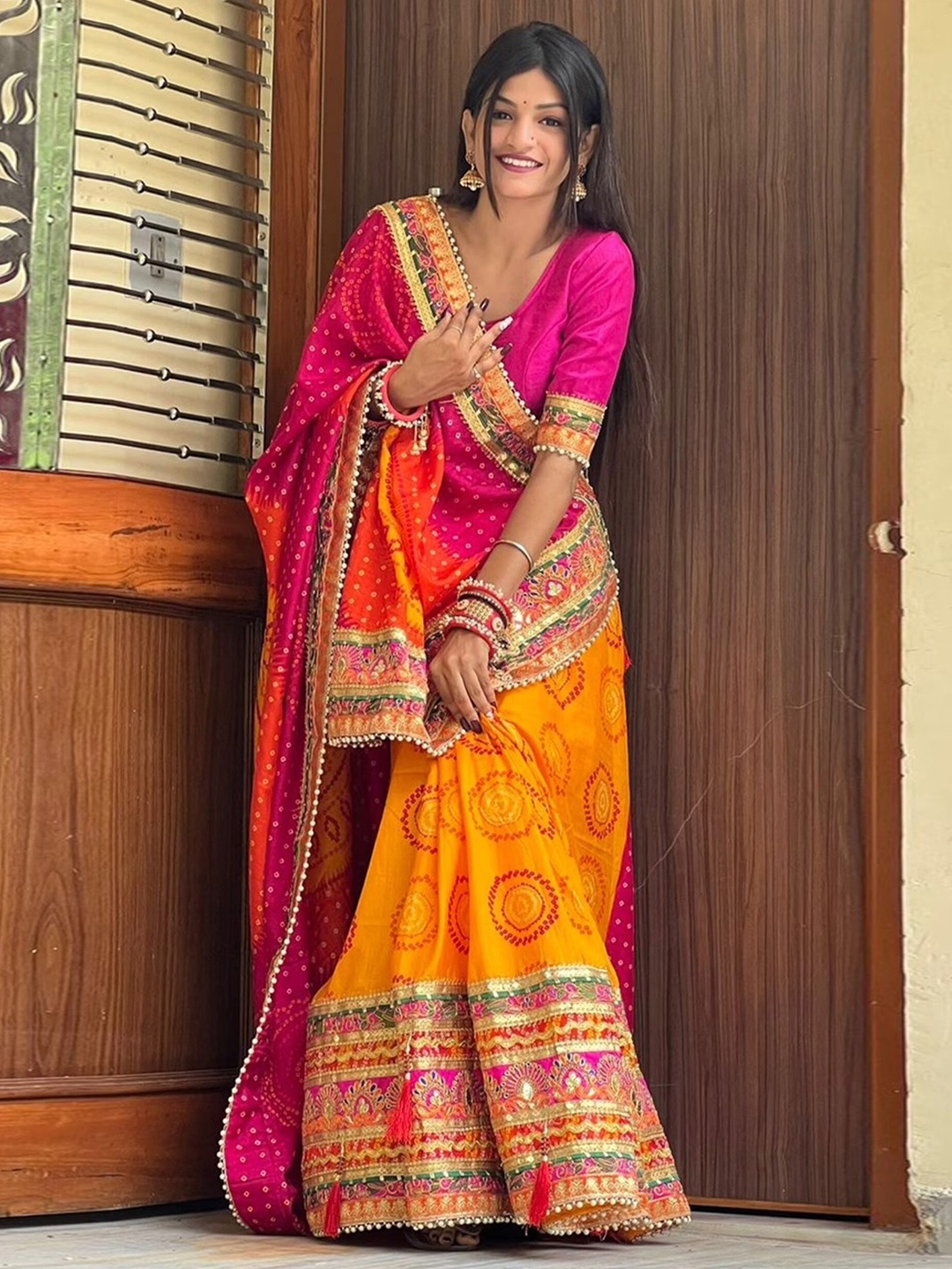 

Mitera Bandhani Printed Gotta Patti Bandhani Saree, Yellow