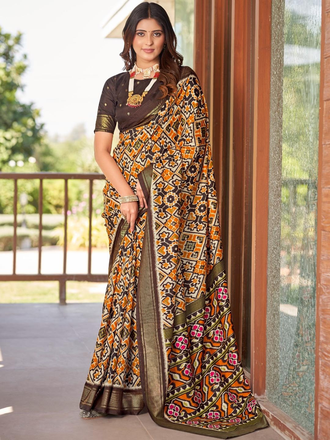 

Silklane Ethnic Motifs Printed Brasso Saree, Brown