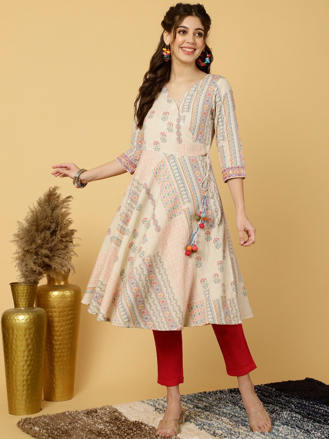 

Jaipur Kurti Women Floral Printed Cold-Shoulder Sleeves Mirror Work Kurta, Beige