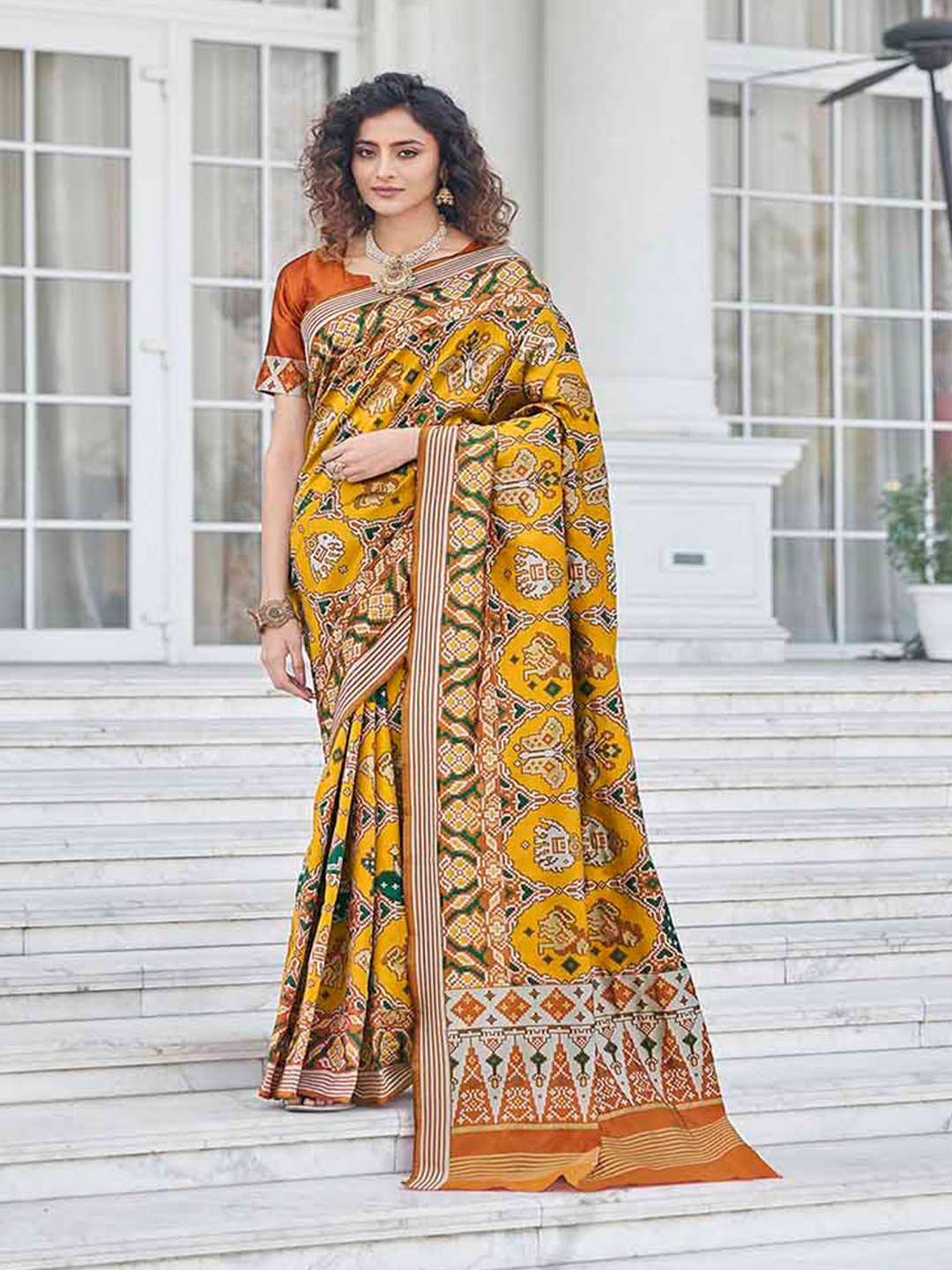 

KALINI Ethnic Motifs Prnted Art Silk Patola Saree, Mustard