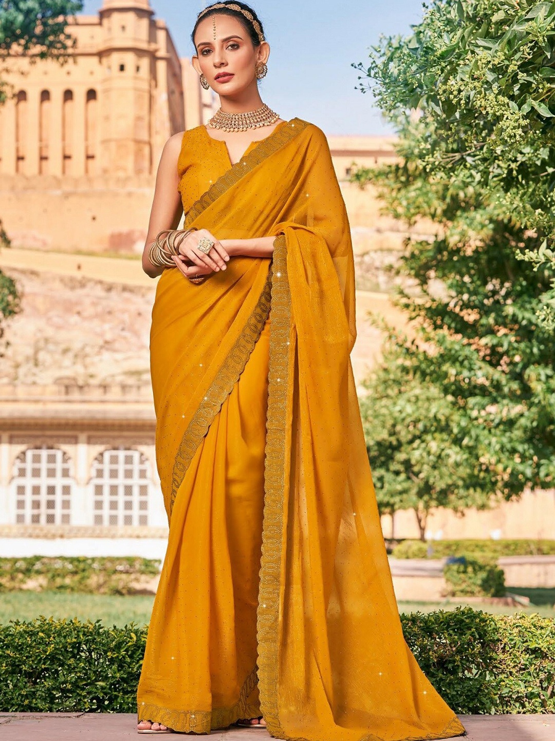 

Kalista Embellished Beads and Stones Pure Chiffon Saree, Mustard