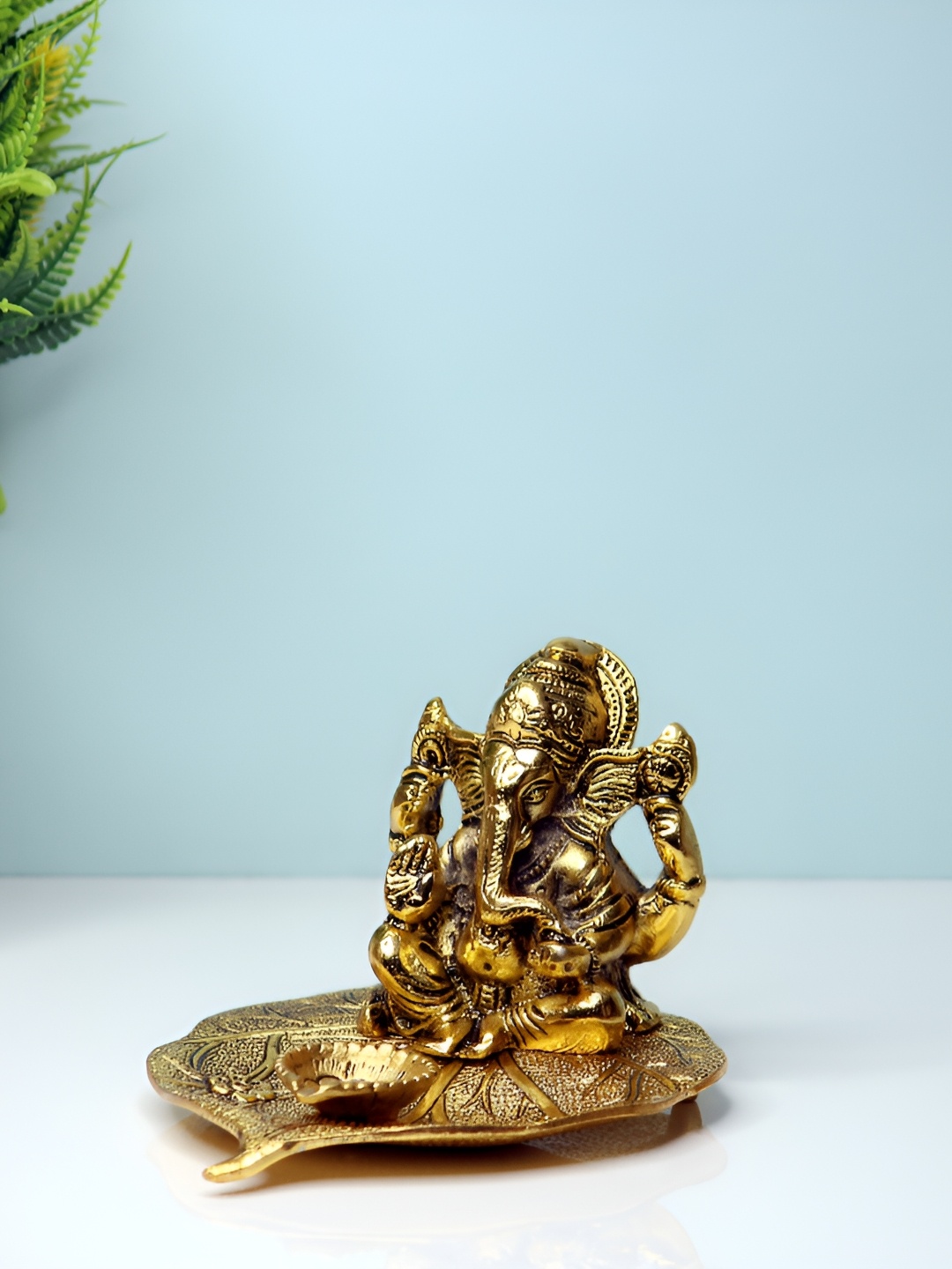 

Navyaksh Gold-Toned Showpiece