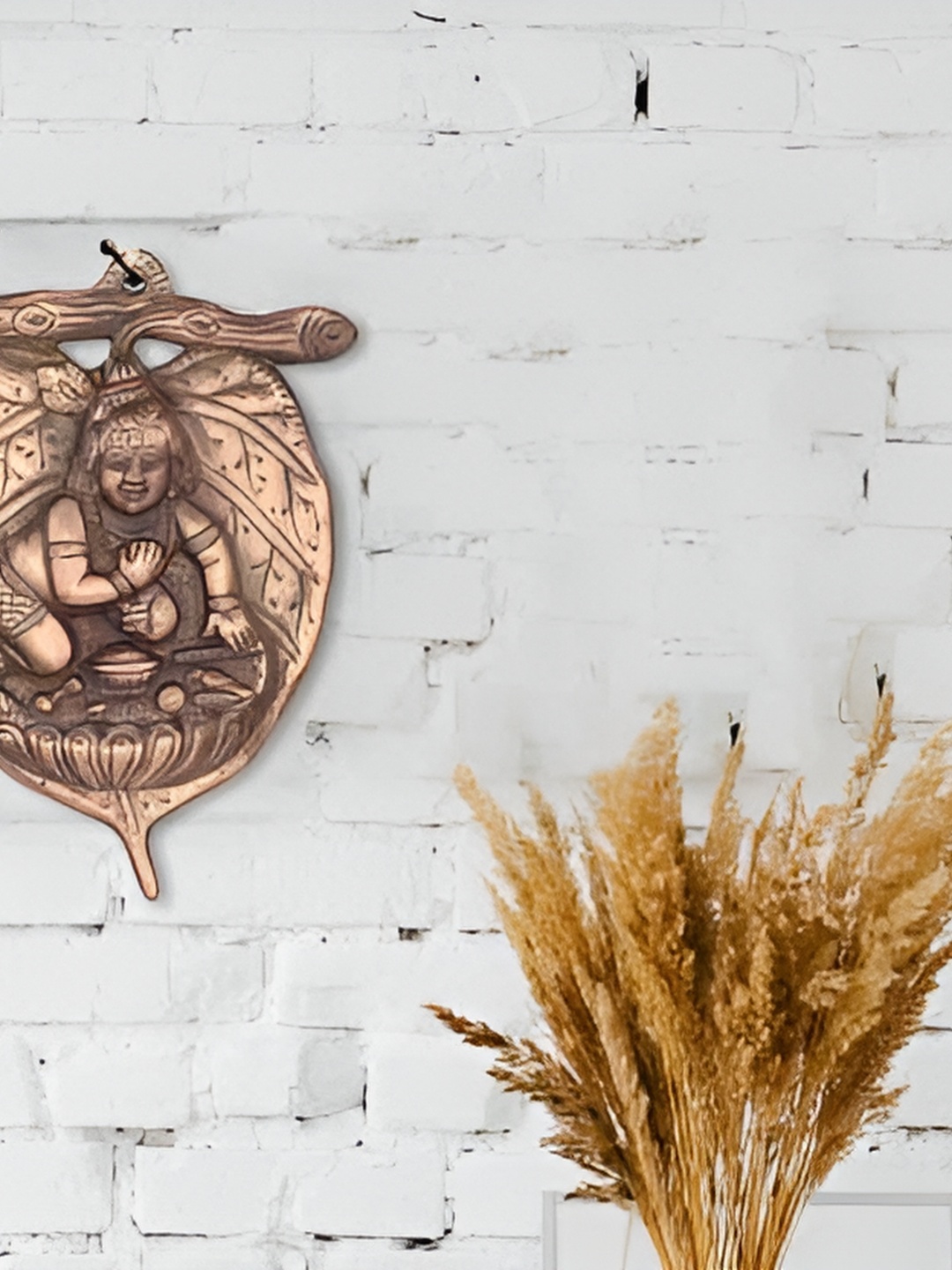 

Navyaksh Copper-Toned Showpiece