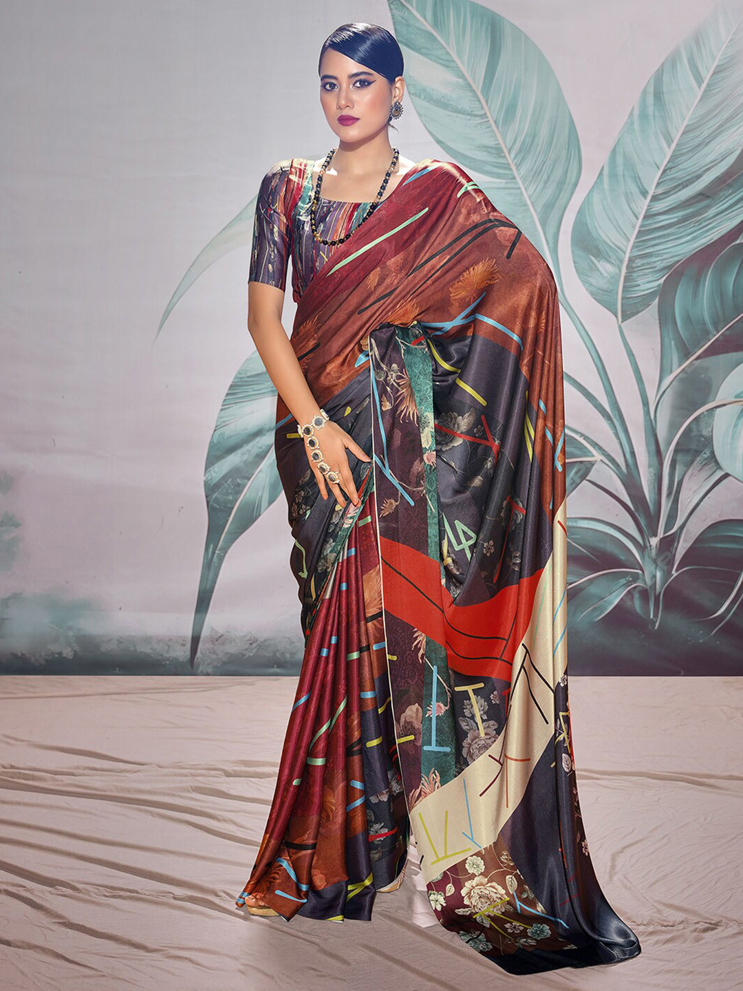 

Mitera Abstract Printed Satin Sungudi Saree, Maroon