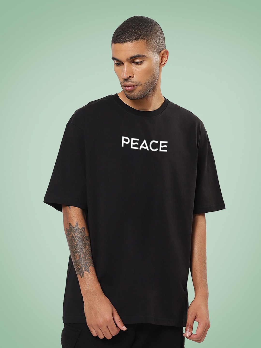

Mad Over Print Peace Printed Drop-Shoulder Sleeves Cotton Oversized Tshirt, Black