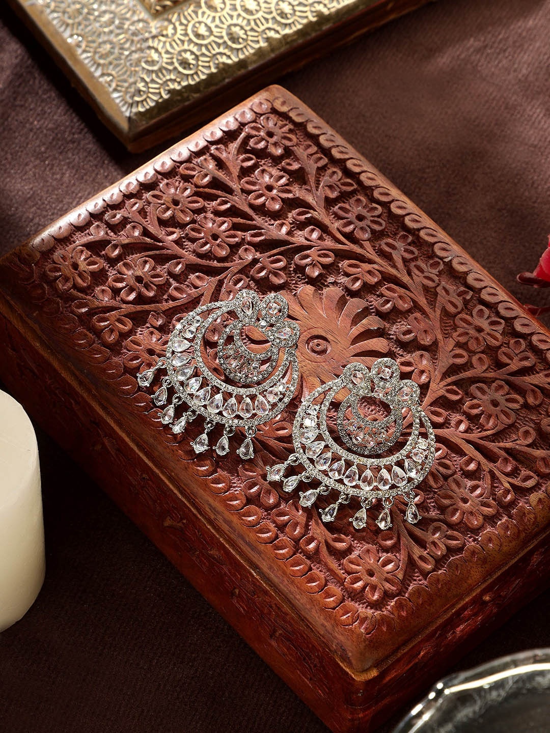 

AARSHVI Silver-Plated American Diamond Contemporary Chandbalis