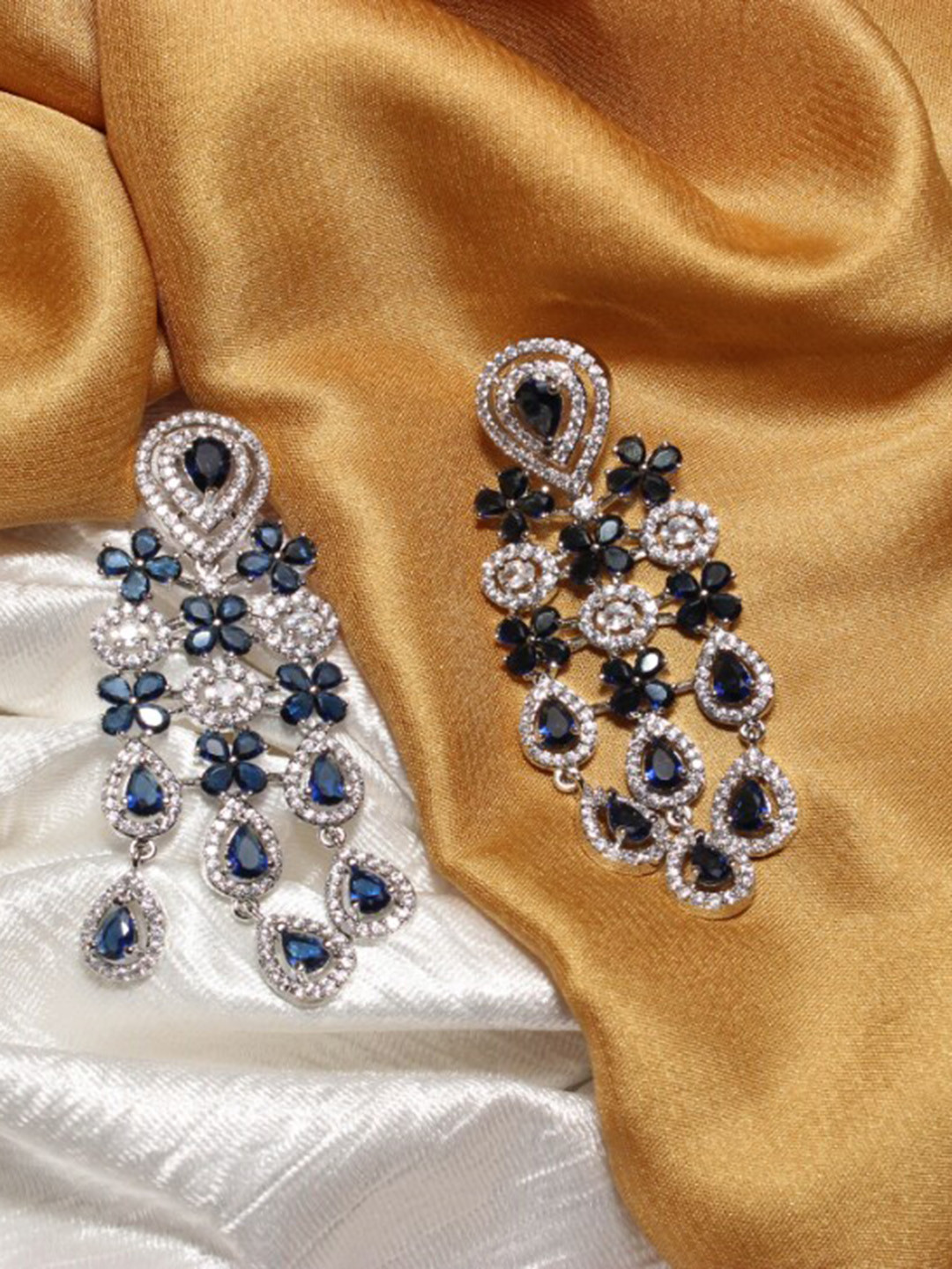 

Maansh Sterling Silver-Plated American Diamond Studded Contemporary Drop Earrings
