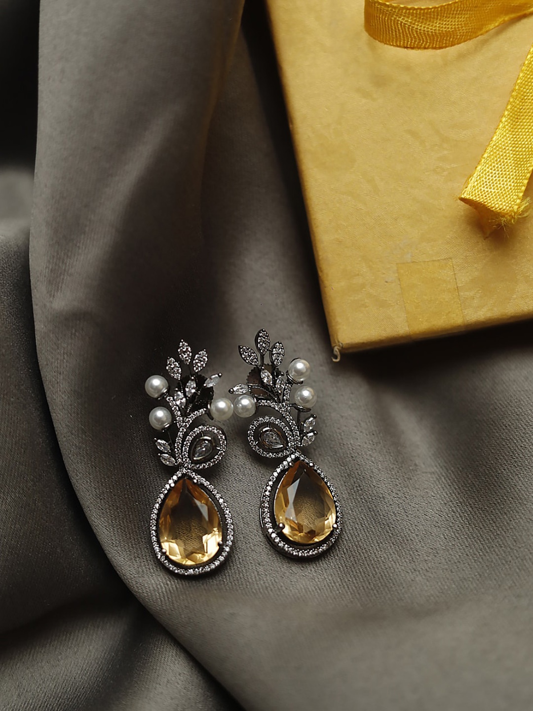 

Maansh Silver-Plated Contemporary Drop Earrings