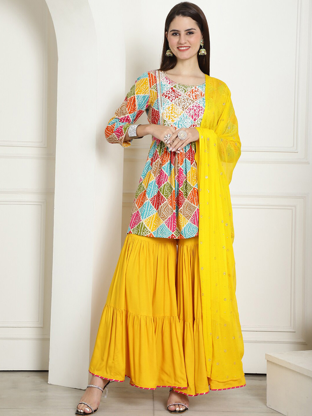 

KALINI Women Bandhani Printed Empire Thread Work Kurta with Sharara & With Dupatta, Mustard