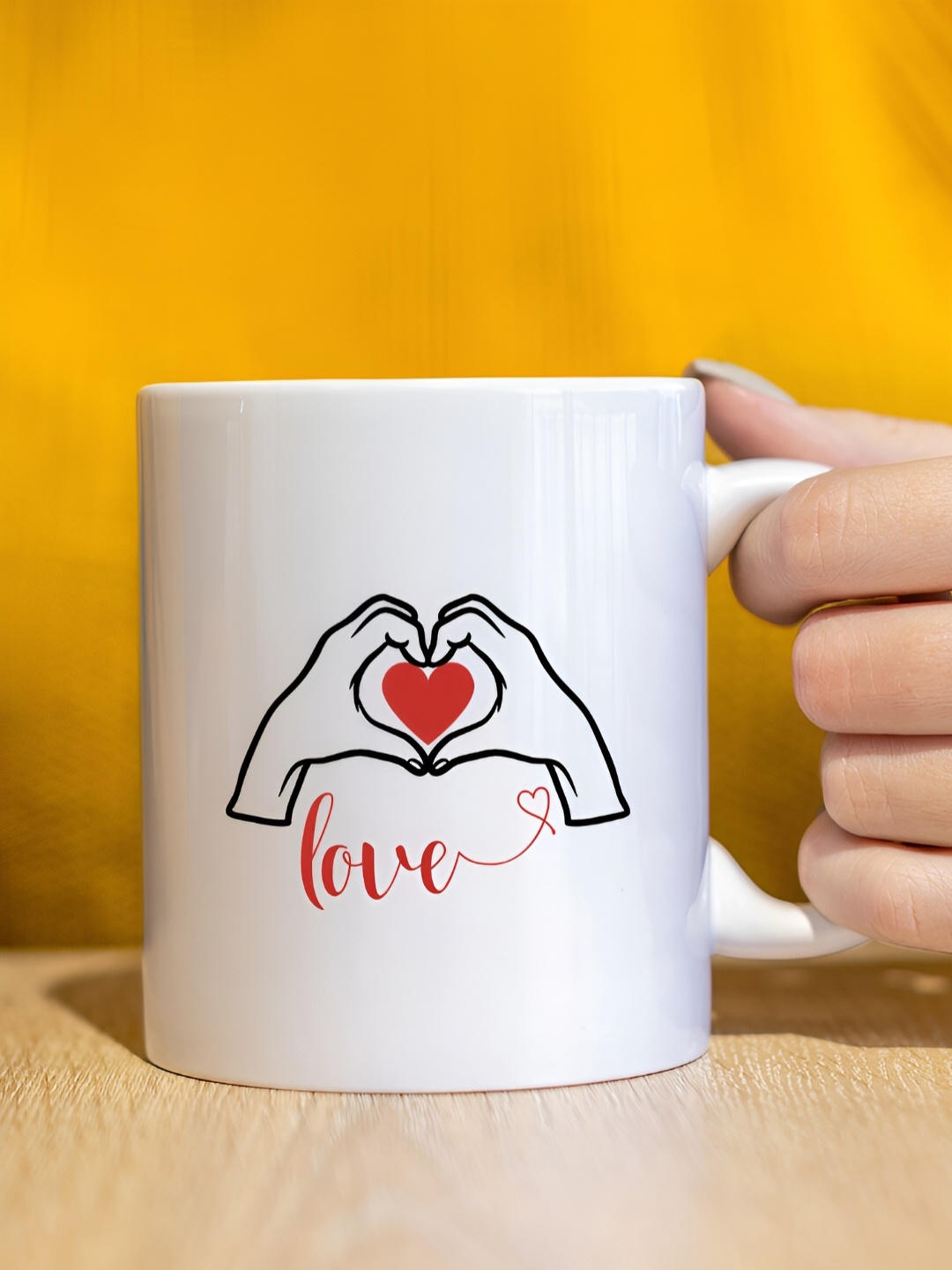 

The Decor Lane White & Red Printed Ceramic Glossy Mug 325 ml