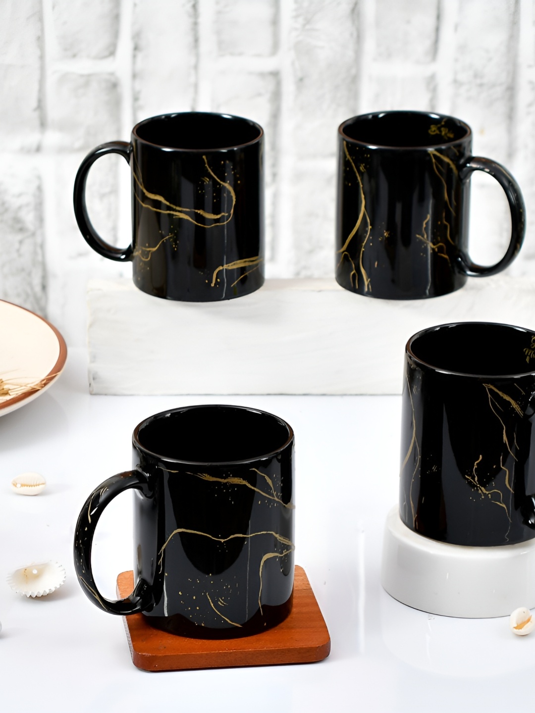 

Home Decor Expert Black & Gold-Toned 4 Pieces Geometric Printed Ceramic Glossy Mugs 370 ml