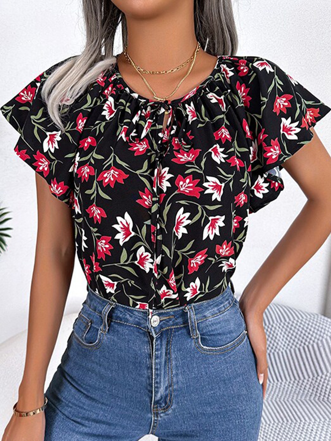

StyleCast Black Floral Printed Tie Up Neck Flutter Sleeve Top