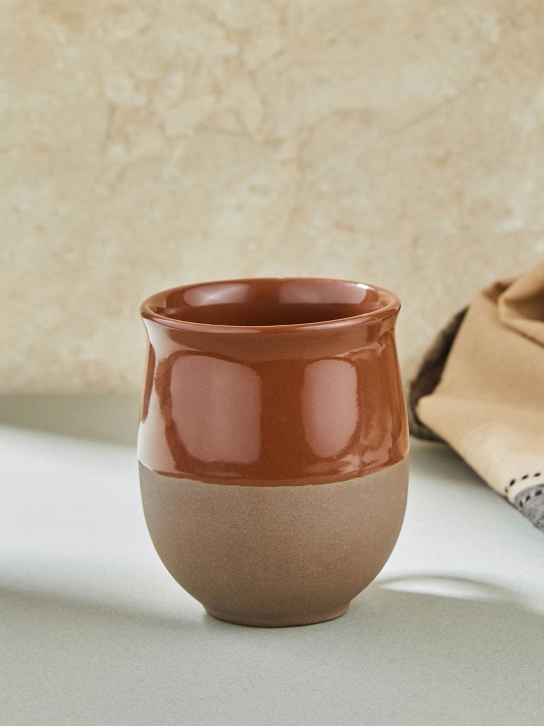 

Fabindia Brown Colourblocked Ceramic Glossy Kulladh