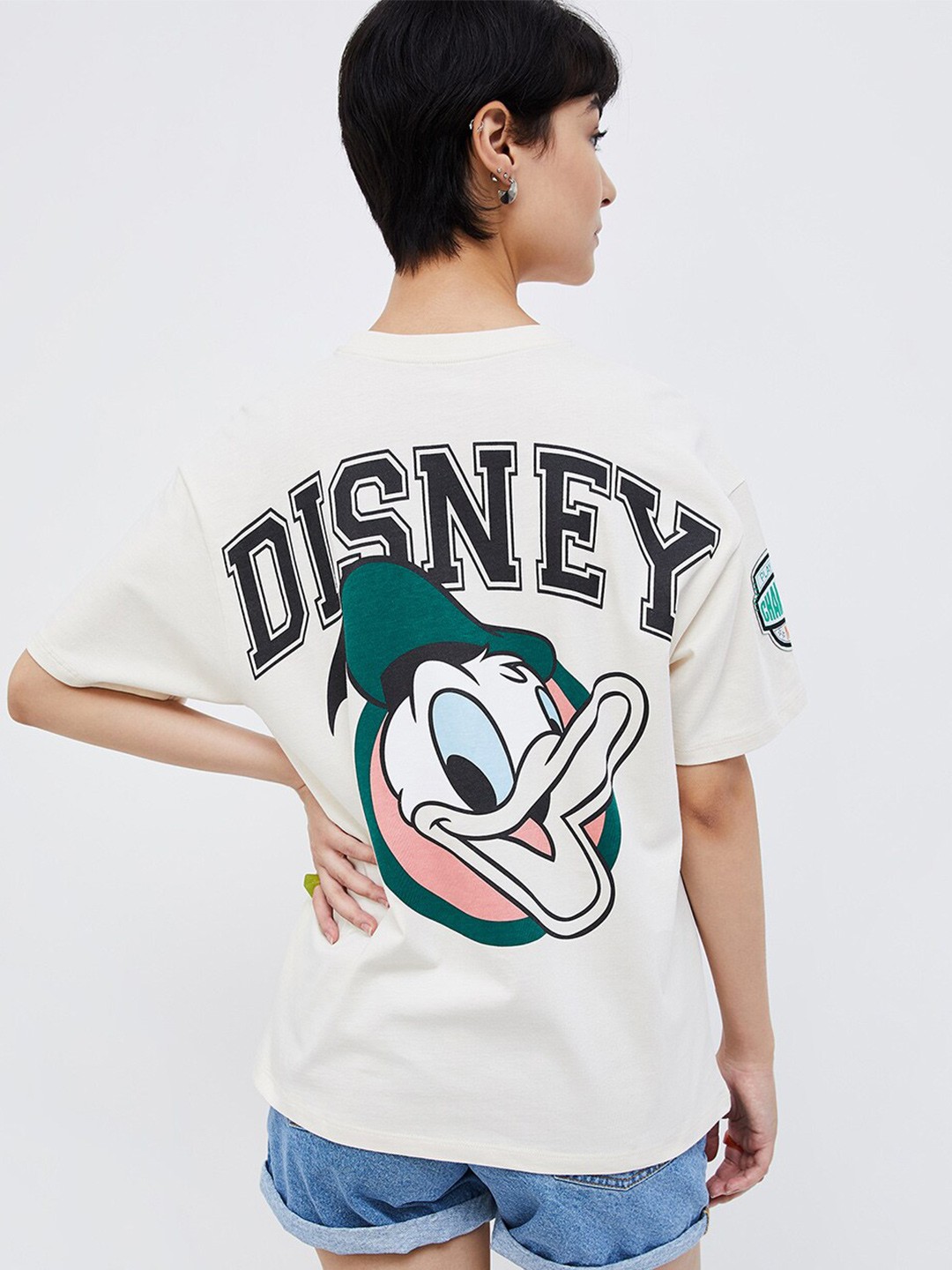 

Ginger by Lifestyle Disney Printed Drop Shoulder Sleeves Pure Cotton Oversized T-shirt, Off white