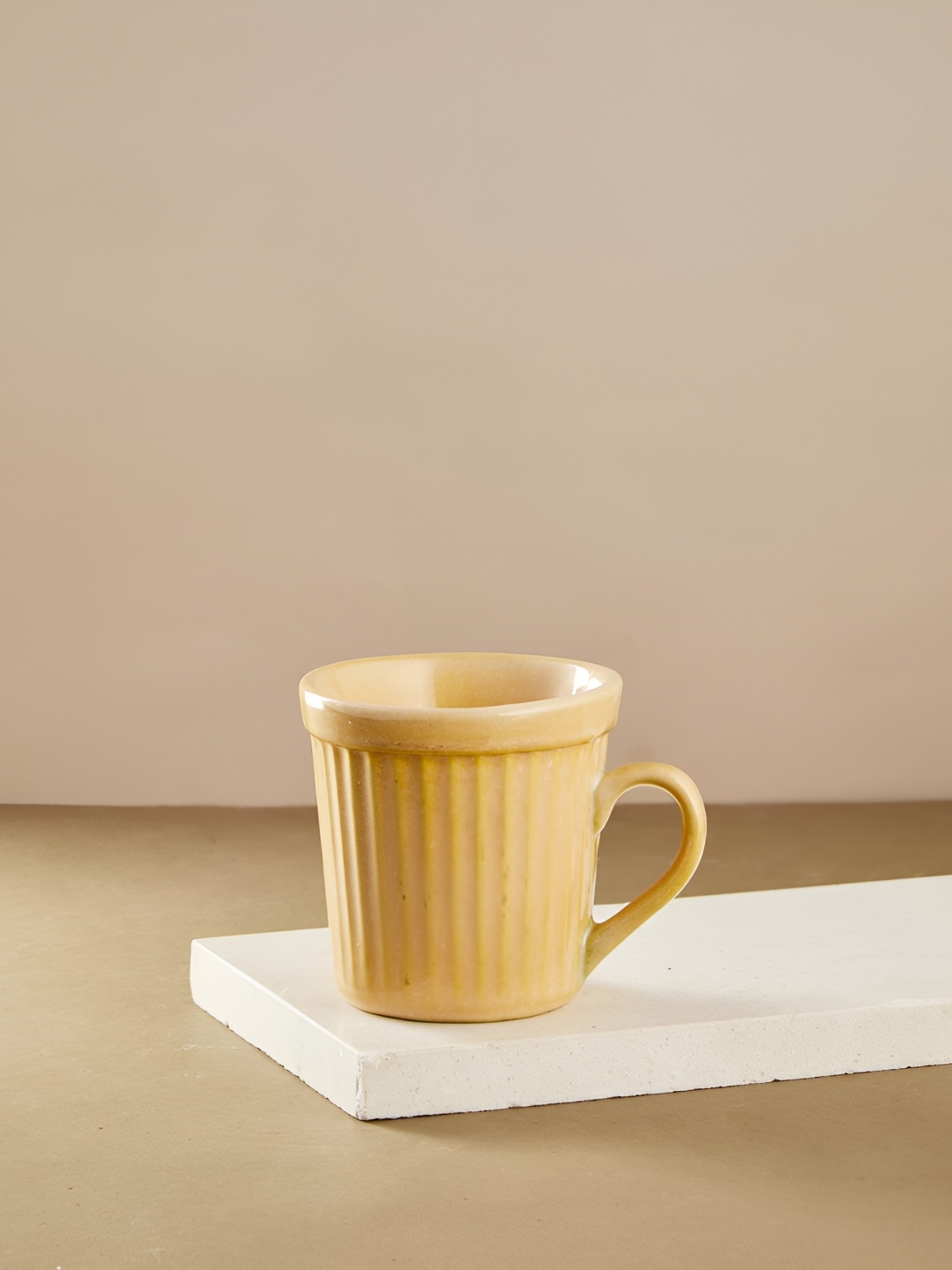 

Fabindia Beige Textured Ceramic Matte Mugs 270 ml