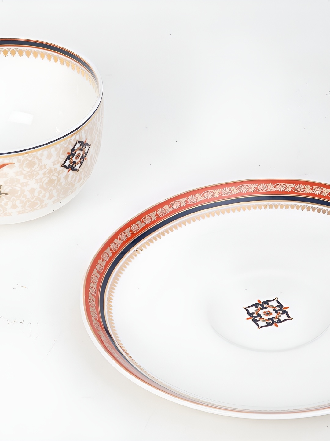 

Fabindia White & Red 2 Pieces Ethnic Motifs Printed Ceramic Glossy Cups and Saucers 250 ml
