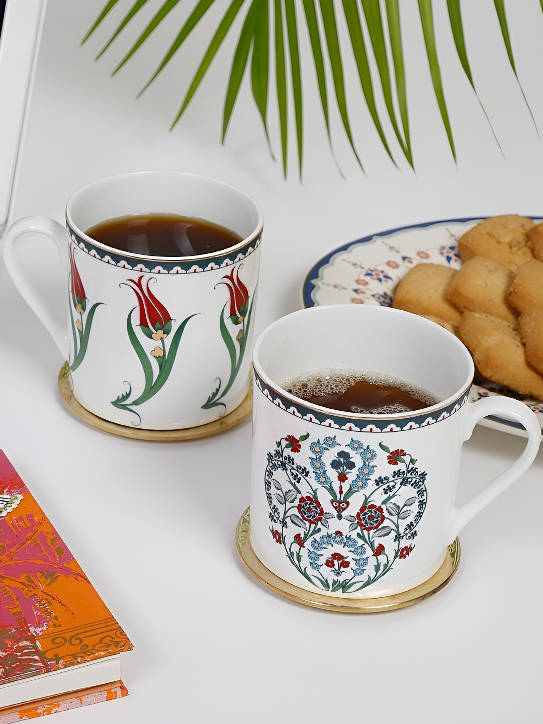 

Fabindia White & Blue 2 Pieces Floral Printed Ceramic Glossy Mugs 370 ml