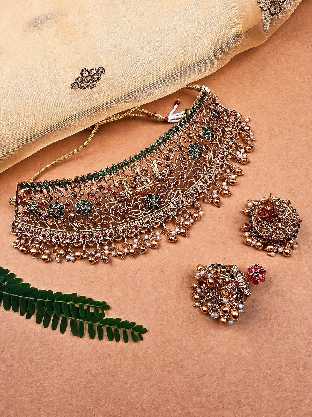 

StileAdda Gold-Plated Stone Studded Temple Choker & Earrings