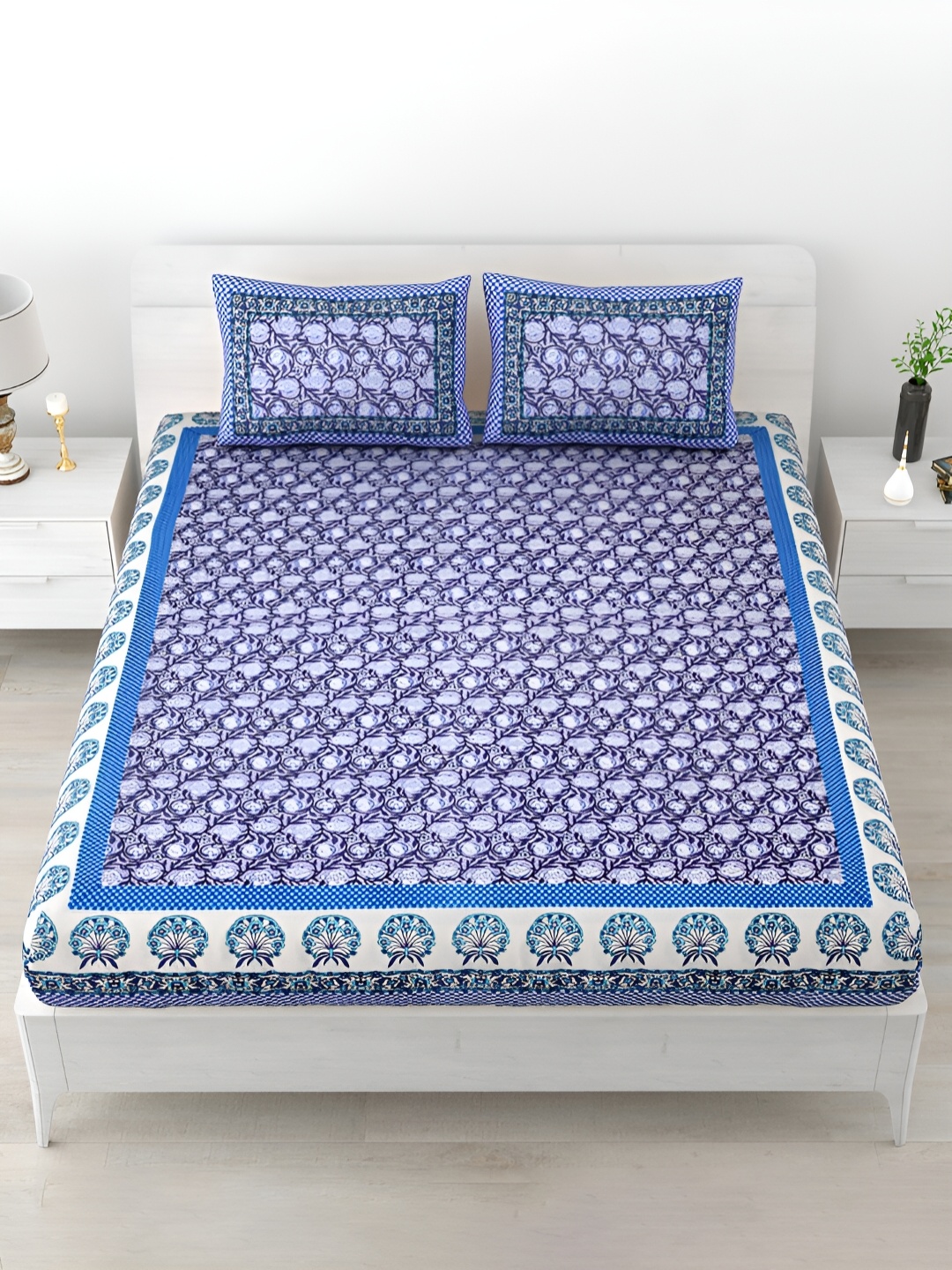 

POORAK Purple & White Floral Printed 120 TC King Cotton Bedsheet with 2 Pillow Covers