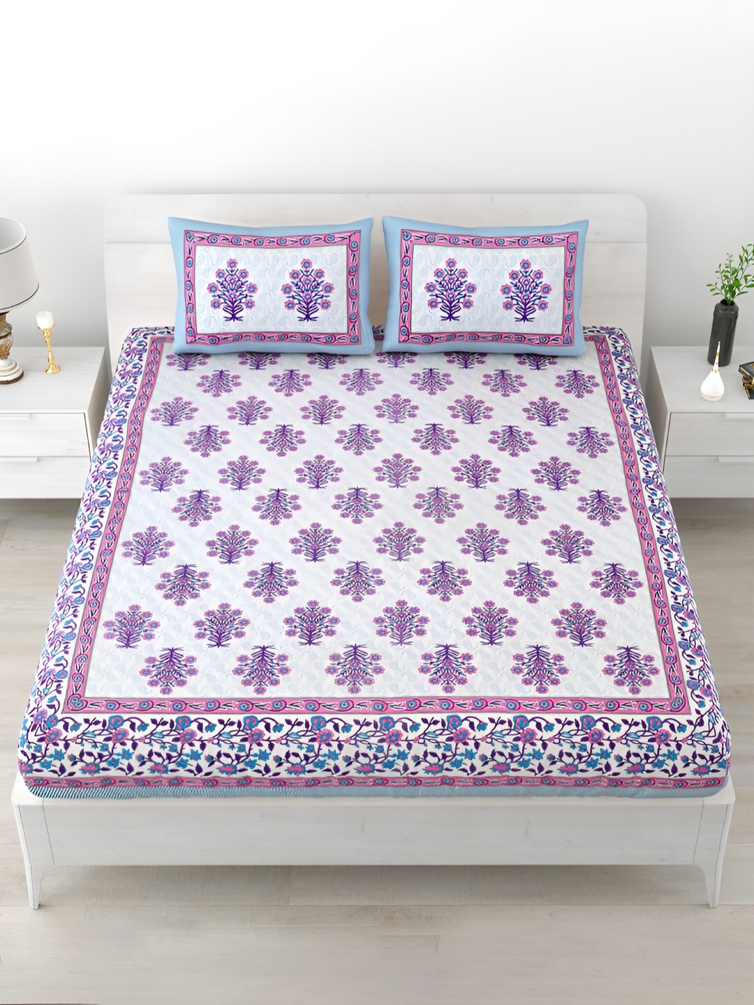 

POORAK Purple & White Floral Printed 120 TC King Cotton Bedsheet with 2 Pillow Covers