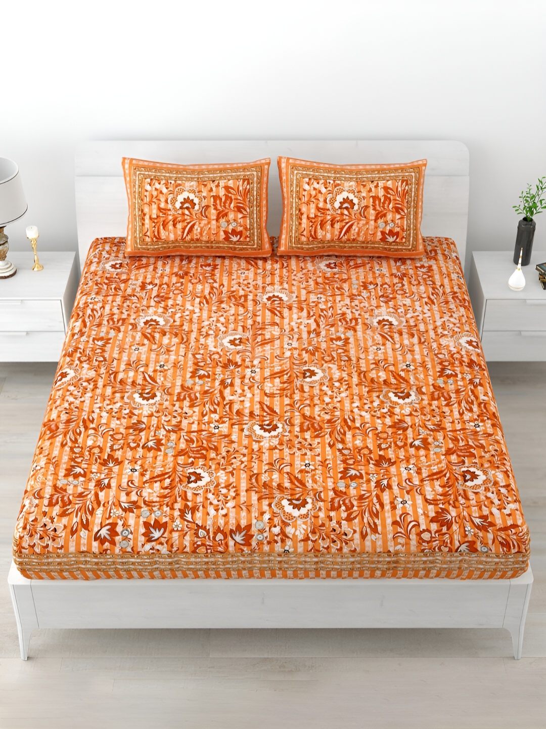 

POORAK Orange & White Floral Printed 120 TC Cotton King Bedsheet with 2 Pillow Covers