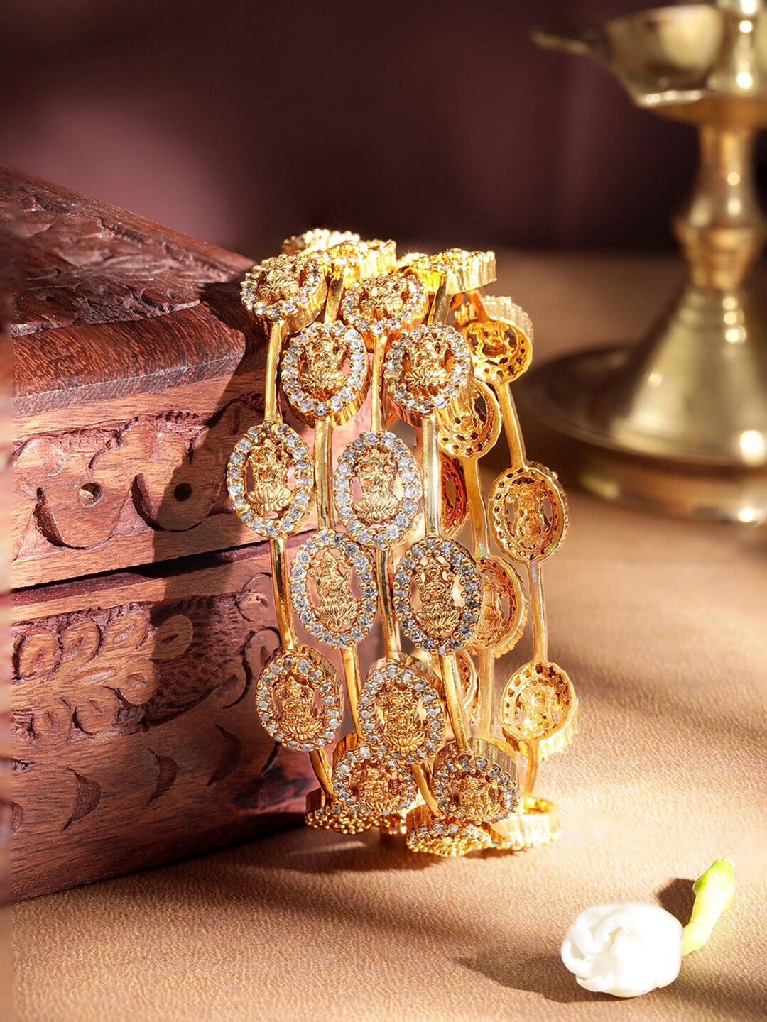 

Rubans Set of 4 Zirconia 22K Gold Plated Studded Temple Bangles