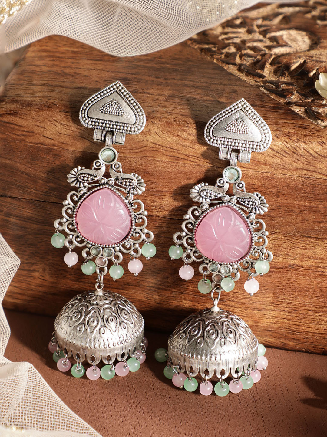 

Rubans Silver-Plated Oxidised Jhumka Earrings with Pastel Pink Gemstone & Mint Green Beads