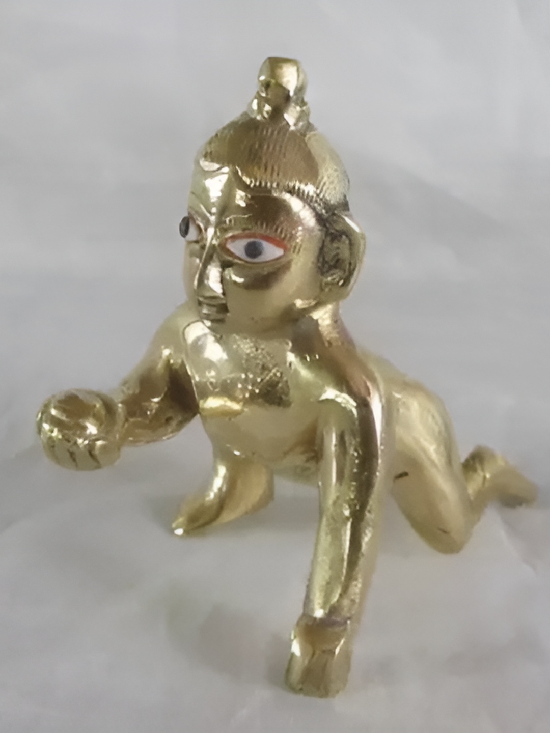 

Navyaksh Gold-Toned Brass Religious Showpiece