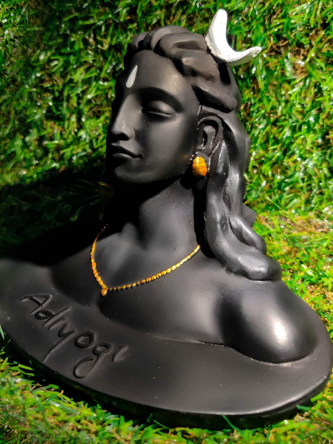 

Navyaksh Black & Gold Toned Religious Idol Showpiece