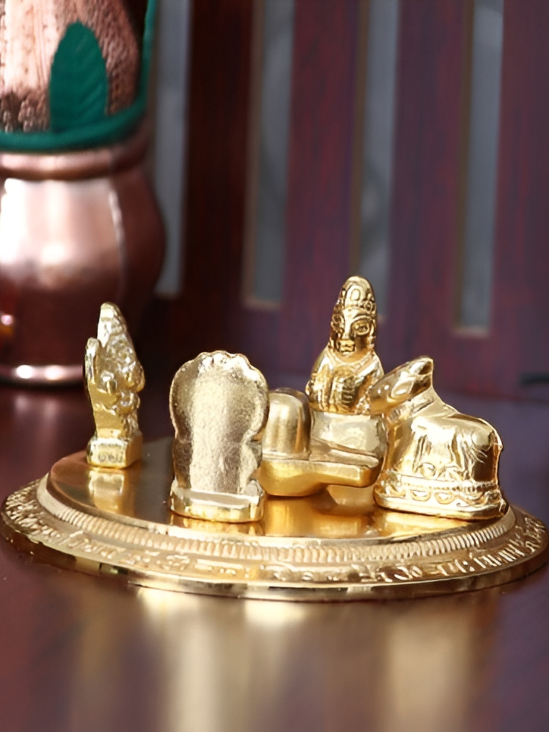 

Navyaksh Gold-Toned Religious Small Round Shiv Pariwar Showpiece