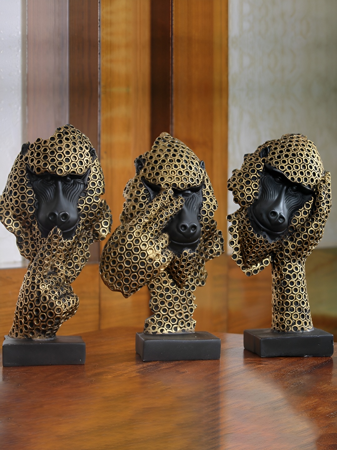 

The Earth Store Gold-Toned 3 Pieces Figurine Showpiece