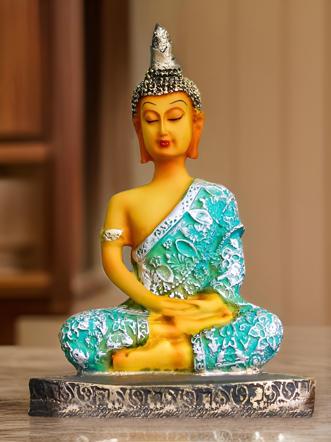 

The Earth Store Yellow Buddha Idol Showpiece