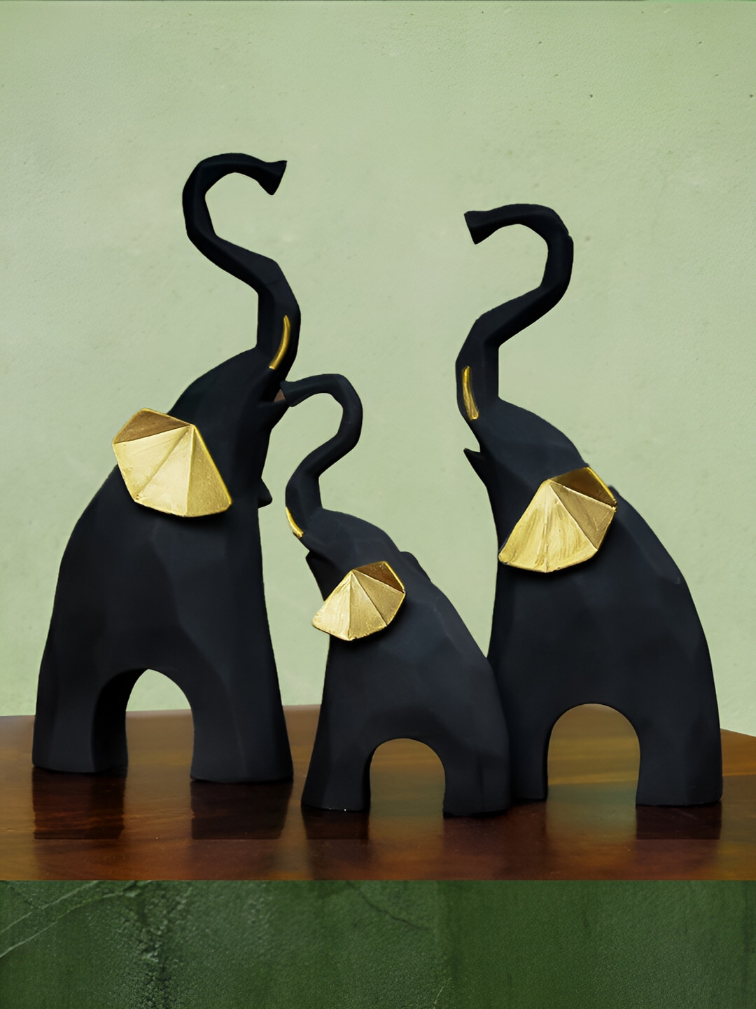 

The Earth Store Black 3 Pieces Figurine Showpiece