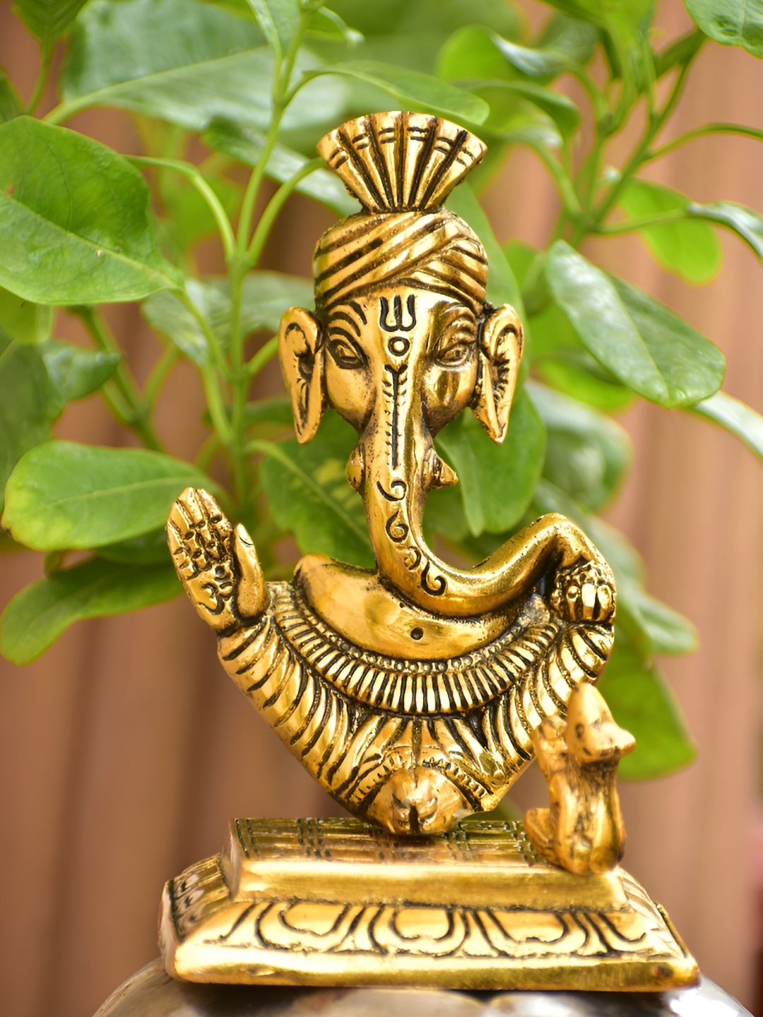

Navyaksh Gold-Toned Metal Ganesh Showpiece