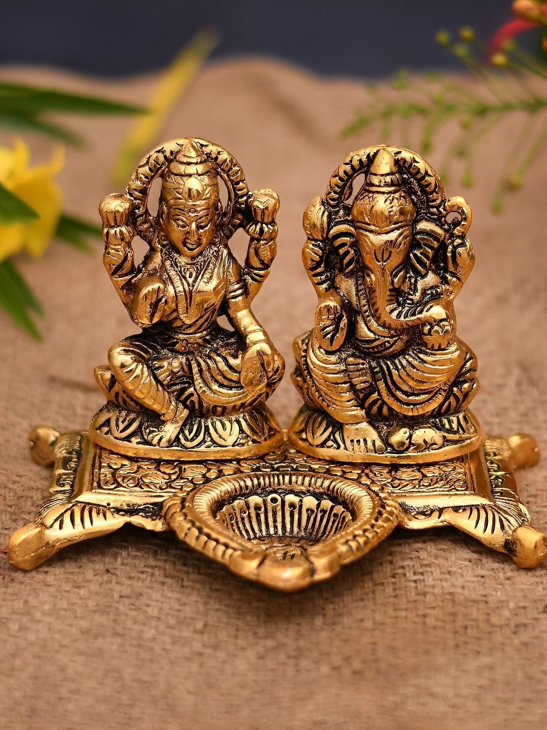 

Navyaksh Gold-Toned Brass Lakshmi Ganesh Showpiece