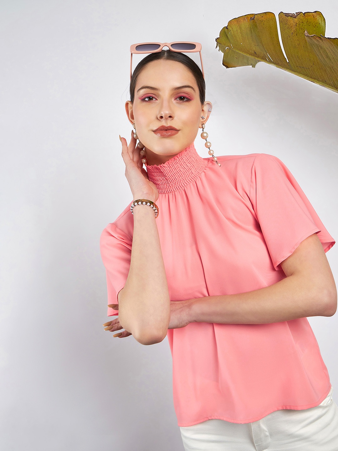 

SASSAFRAS Peach-Coloured High Neck Flared Sleeve Smocked Georgette Top