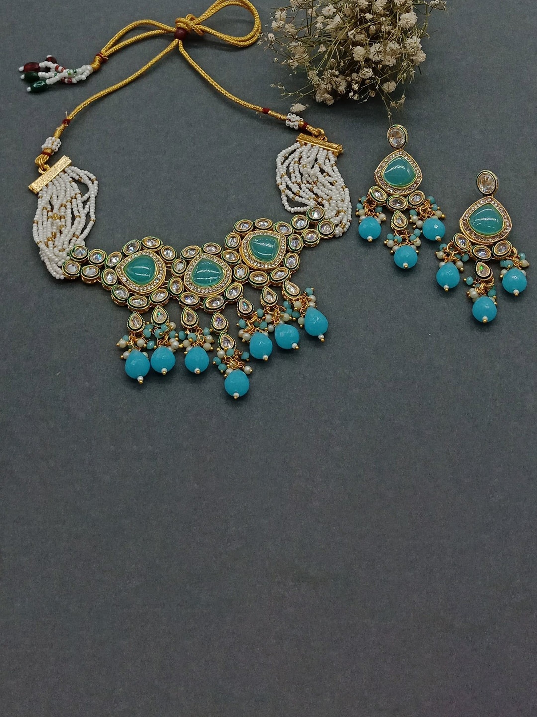 

AASHISH IMITATION Gold-Plated American Diamond-Studded & Beaded Jewellery Set