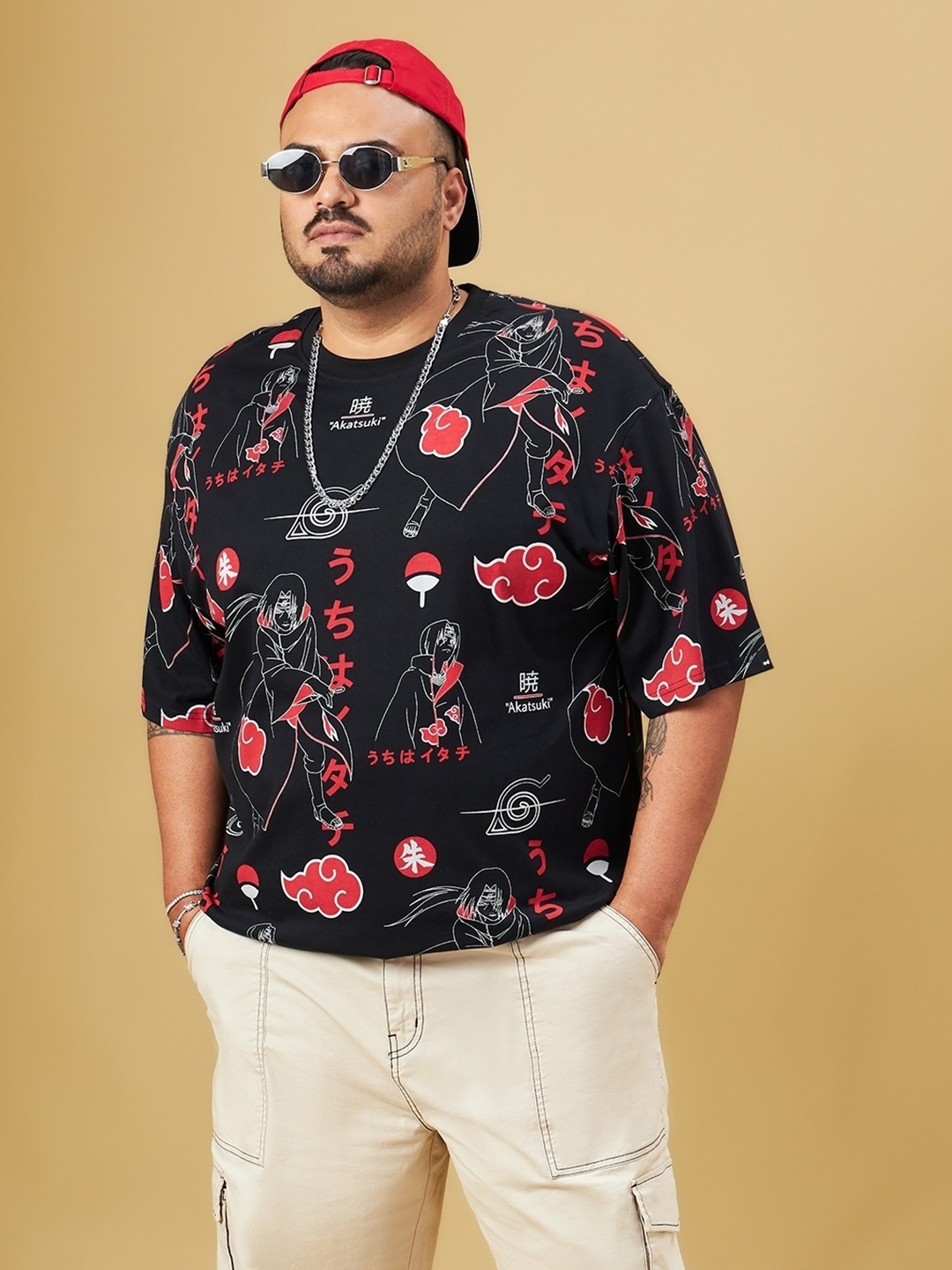 

Bewakoof Plus Size Naruto Printed Drop-Shoulder Sleeves Oversized Cotton T-shirt, Black
