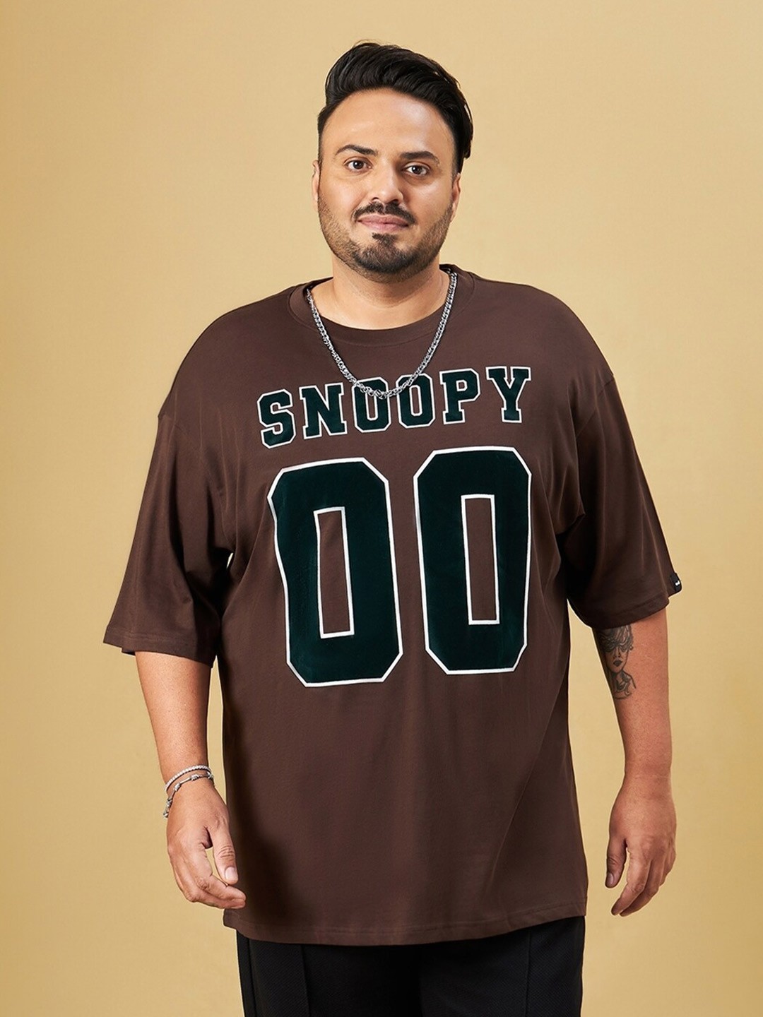 

Bewakoof Plus Size Brown Snoopy Printed Round Neck Short Sleeves Cotton Oversized T-shirt