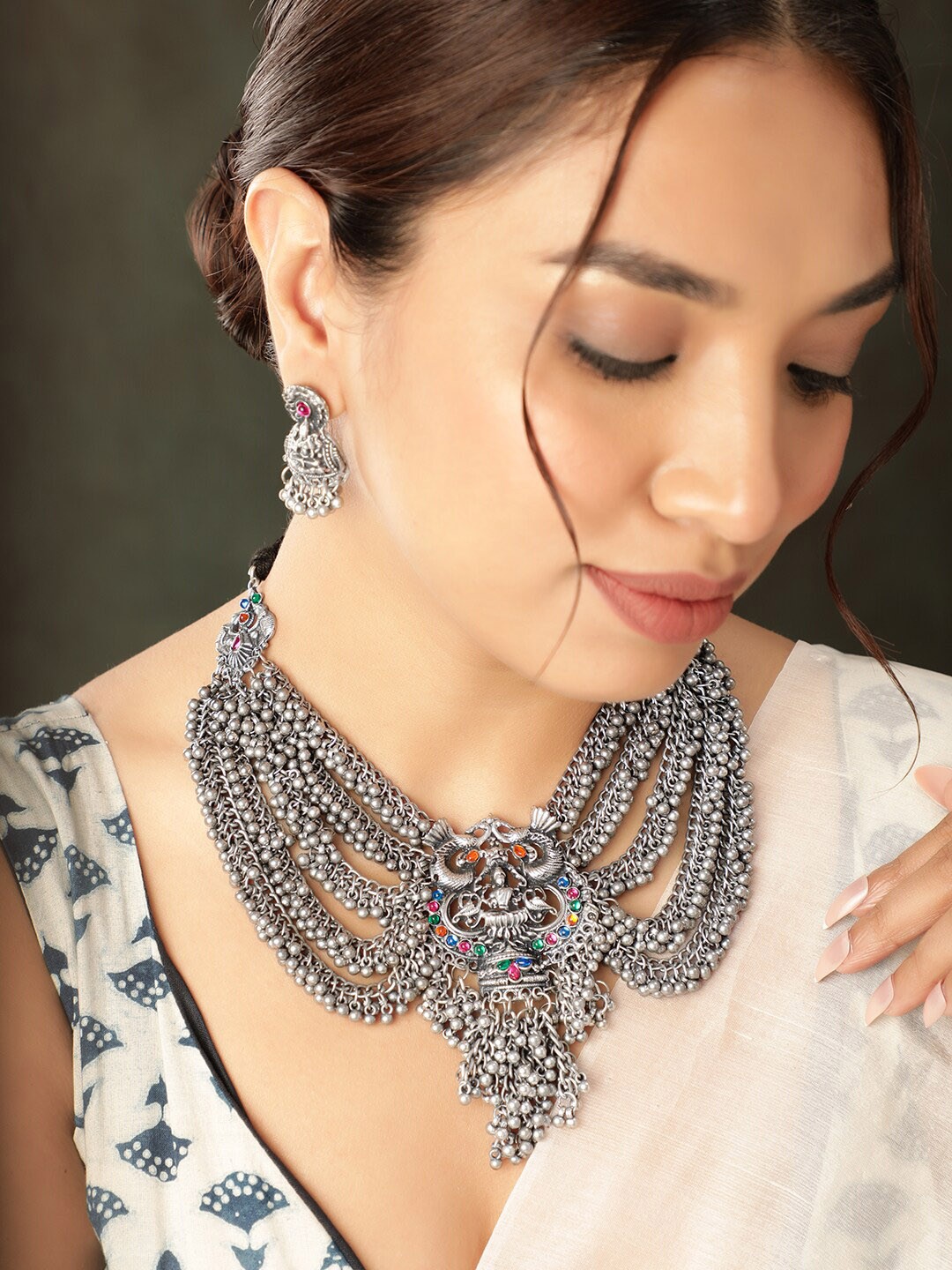 

Rubans Oxidized Silver Goddess Laxmi Accent Multi-layered Ghungroo Necklace Set